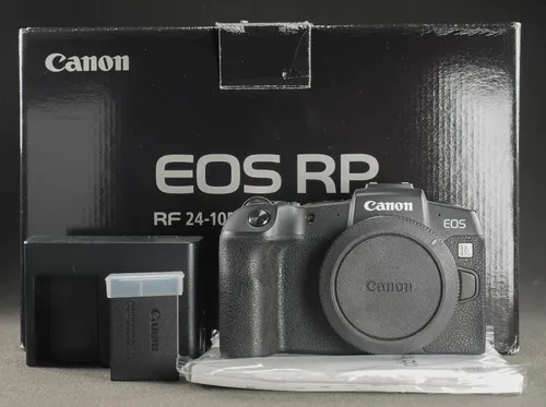 Canon EOS RP Systemkamera Gehäuse, 17.000 Auslösungen, sehr guter Zustand - Spiegellose Systemkamera mit hochwertigem Lithium-Ionen-Akku, ideal für kreative Fotografie und Videos in exzellenter Bildqualität.