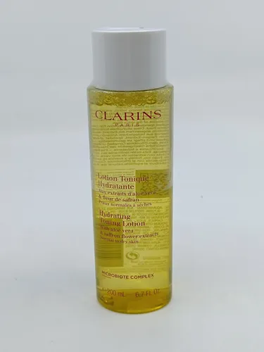 Clarins Hydrating Toning Lotion 200 ml - Tagespflege mit feuchtigkeitsspendender Lotion für normale und trockene Haut, angereichert mit Aloe Vera für einen frischen Teint.