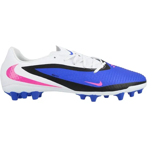 Nike Phantom 6 Low Academy AG - Blau - Der Nike Phantom 6 Low Academy AG ist der perfekte Fußballschuh für Kunstrasen. Mit optimalem Grip und einem leichten Obermaterial ermöglicht er schnelle Bewegungen und präzises Ballgefühl. Ideal für Training und Spiele.