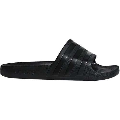 Adidas Adilette Aqua - Schwarz, Stylish und Bequem - Ideal für das Schwimmbad: Diese Adilette vereint minimalistisches Design mit weicher Dämpfung, die müde Füße nach dem Workout schont. Die 3-Streifen sorgen für den typischen adidas Look.