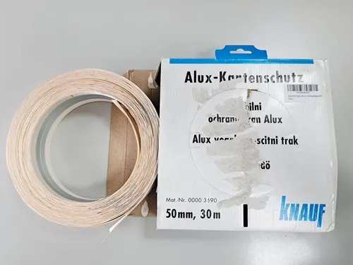 KNAUF® Alux-Kantenschutz - Ecken- & Kantenschutz für optimale Haftung in der Spachtelmasse und verstärkte Ecken durch aufkaschierte Alustreifen, einfach abtrennbar mit Blechschere.