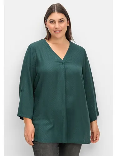 Sheego Tunika in strukturierter Optik - Große Größen 50 - Modische Tunika in tiefgrün, ideal für lässige Outfits. Aus 100% Viskose, figurumspielend mit V-Ausschnitt und langem Arm für optimalen Tragekomfort.