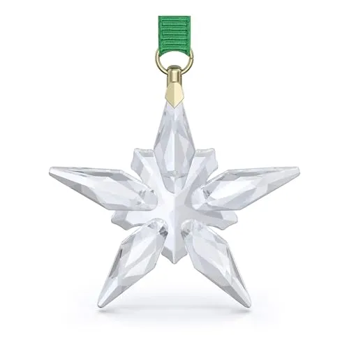 Swarovski Annual Edition Ornament Little Star 2025 - Nussknacker - Wunderschönes sternförmiges Ornament mit 190 Facetten, perfekt für festliche Dekoration und sorgt für funkelnde Lichtakzente während der Feiertage.