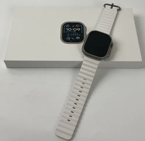 Apple Watch Ultra 2 Cellular 49mm - Titan mit Weißem Ocean Band - Smartwatch mit 64GB Speicher, GPS und robustem Titan-Gehäuse. Ideal für Sport und Outdoor-Aktivitäten.