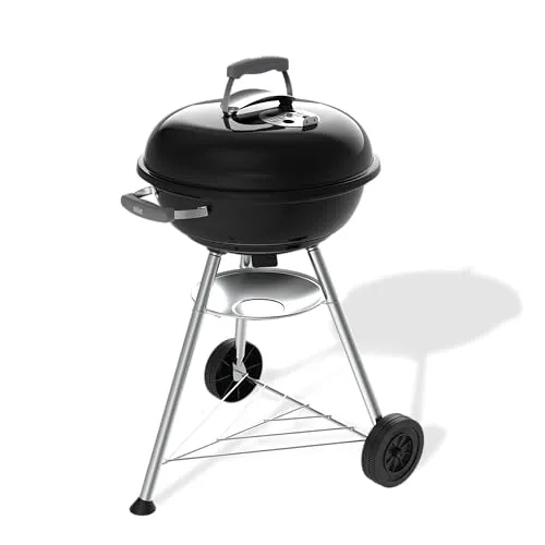 Weber Compact Kettle Holzkohlegrill 47 cm - Schwarz mit Rädern - Der Weber Compact Kettle Holzkohlegrill mit 47 cm Durchmesser vereint modernes Design und Funktionalität. Ideal für Grillabenteuer im Freien, bietet er eine effiziente Hitzeverteilung und einfachen Reinigungsprozess.