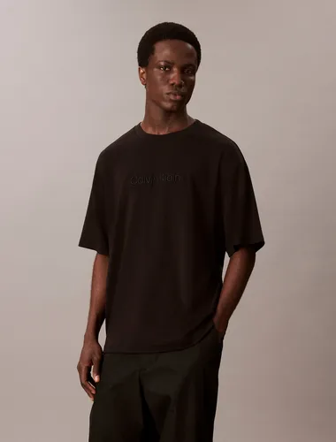T-Shirt "A - Rel Fashion Logo Tee" - Calvin Klein, Gr. M, Black - Stylisches T-Shirt für Männer mit Rundhalsausschnitt und normalem Schnitt. Hergestellt aus weichem Single Jersey für höchsten Tragekomfort.