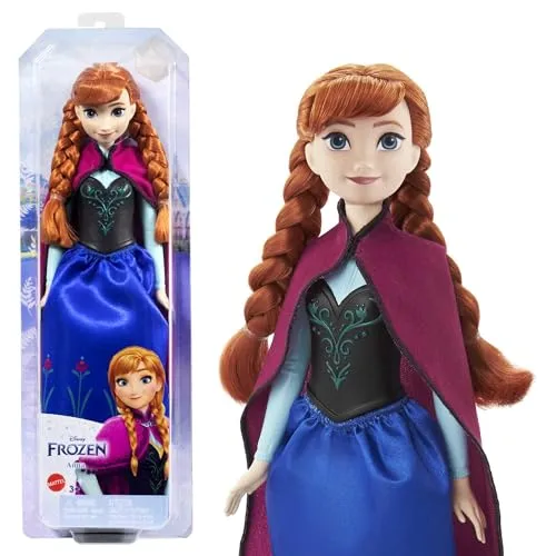 Mattel Disney Prinzessin Anna Puppe - Bewegliche Eiskönigin Puppe mit kämmbarem Haar im Reiseoutfit und abnehmbarem Umhang, perfektes Geschenk für kleine Fans