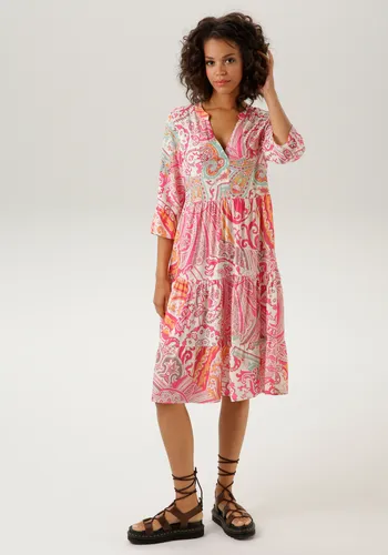 Aniston CASUAL Blusenkleid mit Paisley-Druck - Gemusterte Kleider mit großflächigem Paisley-Druck, lässig geschnitten und ideal für den femininen Look an warmen Tagen.