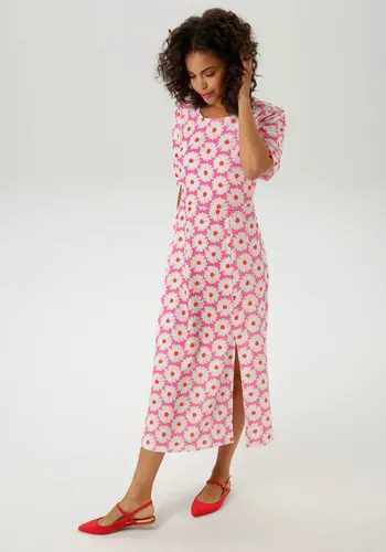 Sommerkleid mit Blüten-Druck - NEUE KOLLEKTION, Gr. 48 - Sommerkleid in pink-wollweiß-rot, figurumspielend mit raffiniertem Schlitz im Saum. Ideal für warme Tage, aus elastischem Jersey für hohen Tragekomfort.