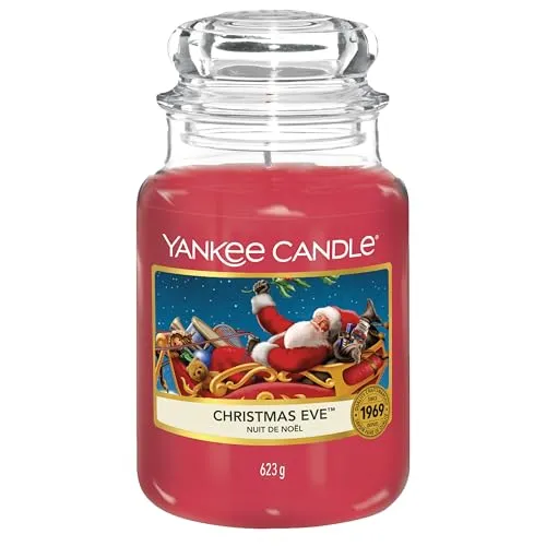 Yankee Candle Christmas Eve Duftkerze im Glas (groß) - Genießen Sie die festliche Atmosphäre mit der Christmas Eve Duftkerze. Sie bietet bis zu 150 Stunden langanhaltenden, gleichmäßigen Duft und ein elegantes Design im klassischen Glastiegel.