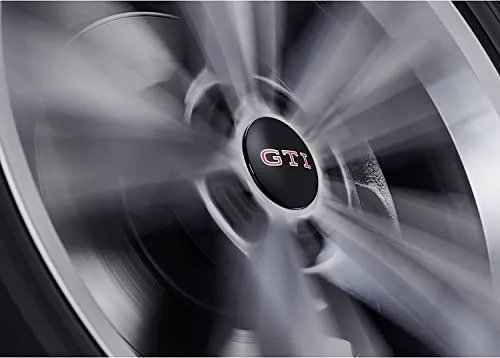 Volkswagen Nabenkappen GTI, dynamisch (4 Stück) - Original VW Radnabenkappen mit stehendem GTI Logo, ideal für Leichtmetallfelgen. Farblich ansprechend in schwarz glänzend, aus schlagfestem Kunststoff für hohe Langlebigkeit.