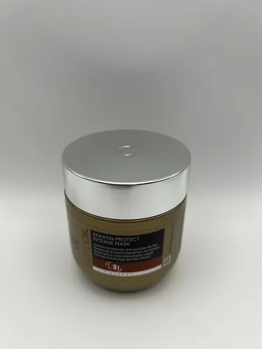 System Professional LipidCode LuxeOil Keratin Protect Intense Mask 200 ml - Haarkuren mit intensiv regenerierender Formel, angereichert mit Shea Butter für mehr Geschmeidigkeit und verbesserte Stylebarkeit.