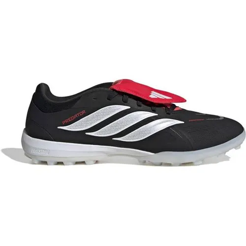 ADIDAS Herren Fußball-Hartplatzschuhe PREDATOR PRO TF mit umschlagbarer Zunge - Maximiere deine Leistung auf dem Platz mit den PREDATOR PRO TF Schuhen. Sie bieten optimalen Grip und Stabilität für dynamisches Spiel auf Kunstrasen. Erlebe den perfekten Mix aus Komfort und Kontrolle.
