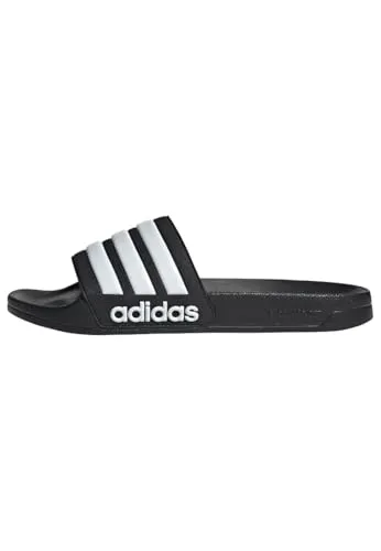 ADIDAS Badeslipper Shower adilette - Bademode mit unschlagbarem Komfort, ideal für Schwimmbad und Zuhause. Leicht und dämpfend für angenehmes Tragegefühl – der sportliche Style mit adidas Logo und 3-Streifen macht sie zum perfekten Begleiter.