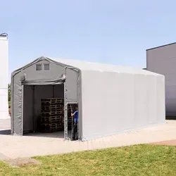 Toolport Zelthalle 6x12 m - Robustes Lagerzelt mit Hochziehtor - Diese stabile Zelthalle mit 4 m Seitenhöhe ist ideal für den ganzjährigen Einsatz. Die hochwertige PVC-Plane sorgt für Wetterbeständigkeit, während das durchdachte Design die Installation erleichtert.