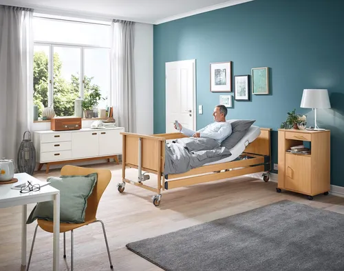 Burmeier Pflegebett Dali mit Holzliegefläche - Medizinischer Bedarf - Das meistverkaufte Pflegebett Deutschlands mit kabelloser Fernbedienung und 24-Volt-Antriebssystem für hohen Komfort und Sicherheit.