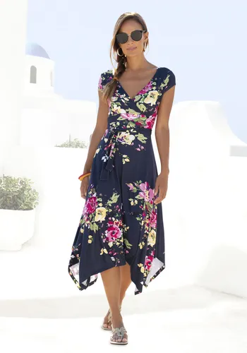 Sommerkleid mit Zipfelsaum und Schleife in der Taille - Trendfarbe Blau: Leichtes Jerseykleid mit buntem Blumendruck und überlappendem V-Ausschnitt, ideal für Strandtage oder sommerliche Ausflüge.