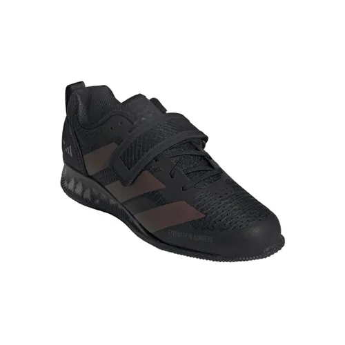 adidas Adipower Weightlifting III Herren-Fitnessschuhe in Schwarz/Carbon, Größe 44 2/3 - Ideal für Gewichtheber: Der adidas Adipower Weightlifting III bietet einen stabilen Halt dank Riemen und Schnürsenkeln. Der erhöhte Fersenbereich sorgt für eine optimale Positionierung auf der Matte.