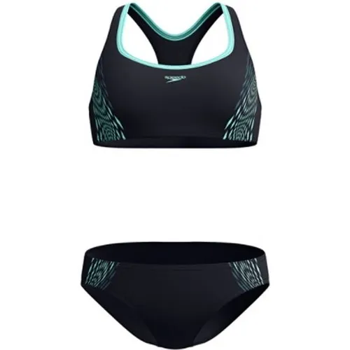 SPEEDO Damen Bikini Womens Placement 2 Piece - Bademode, sportlicher Bikini mit türkisfarbener "Shear Wave"-Grafik. Racerback-Design für volle Beweglichkeit und schnelltrocknendes Endurance+ Material für hohe Chlorbeständigkeit.