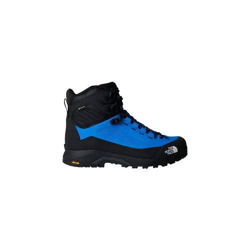 The North Face Herren Verto Alpine Mid Gore-Tex Stiefel in Hero Blue/TNF Black - Die Verto Alpine Mid Gore-Tex Stiefel von The North Face bieten optimalen Schutz bei Trekking- und Wandertouren. Wasserdicht, atmungsaktiv und mit hervorragender Traktion ausgestattet, sind sie ideal für anspruchsvolle Bedingungen.