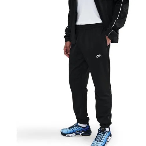 NIKE Herren Sportanzug Sportswear Club - Bequemer Trainingsanzug aus leichtem Poly-Strickmaterial. Er vereint klassischen Stil mit modernem Komfort und sorgt für ein entspanntes Tragegefühl bei jeder Aktivität.