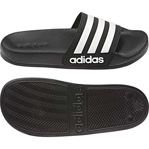 Adidas Adilette Shower Kinder - Schwarz - Bequemer Slipper für Kinder, ideal für Pool oder Dusche. Mit schnell trocknendem Cloudfoam Fußbett und klassischem Sportstyle. Leichte EVA-Außensohle sorgt für zusätzlichen Komfort.