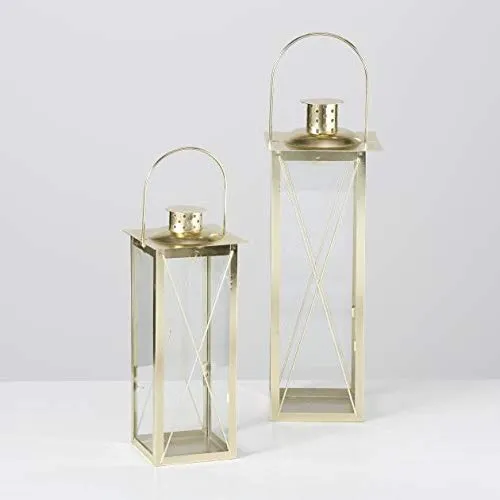 BOLTZE Farol Laterne Gold 2tlg - Laternen-Set in elegantem Golddesign, perfekt für stilvolle Innenräume. Mit 32cm und 40cm Höhe sorgt es für Gemütlichkeit und ist auch eine tolle Geschenkidee.