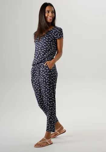 Stylischer Jumpsuit mit Palmen-Print in Dunkelblau - Gr. 36 - Kleider & Overalls: Figurbetonter Jumpsuit mit V-Ausschnitt, kurzen Ärmeln und praktischen Taschen. Perfekt für einen lässigen Sommerlook!