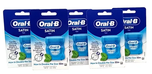 Oral-B SatinTape Zahnseide gewachst Minze - 5x 50m Packung - Praktische Zahnzwischenraumpflege mit erfrischendem Minzgeschmack. Die gewachste Zahnseide sorgt für eine einfache Anwendung und effektive Reinigung. Ideal für die tägliche Mundhygiene.
