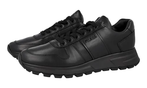 PRADA Leder Prax01 Sneaker - Schwarz Plateau - NEU - Hochwertige Herren Sneaker aus Leder mit komfortablem Plateau und rutschfester Gummisohle, perfekt für einen stilvollen Auftritt.