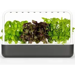Click & Grow Smart Garden 9 Grau - Moderner Smart-Blumentopf für 9 Pflanzen, benötigt spezielles Substrat. Mit diesem cleveren System wird das Anbauen von Kräutern in Ihrer Wohnung zum Kinderspiel – genießen Sie frische Aromen direkt aus Ihrem Garten!