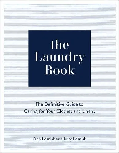 The Laundry Book: Ein umfassender Leitfaden für die Pflege Ihrer Kleidung und Textilien - Bücher: Hardback mit 224 Seiten, bietet wertvolle Tipps zur optimalen Pflege von Kleidung und Wäsche.
