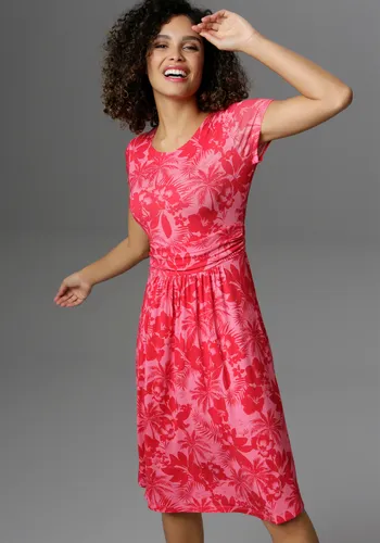 Modisches Sommerkleid mit Palmen und Blüten, Gr. 38 - N-Gr, pink-rot - Sommerkleider mit knalligen Farben und floralem Druck. Figurbetontes Jerseykleid aus Viskose/Elasthan, ideal für warme Tage und vielseitig kombinierbar.