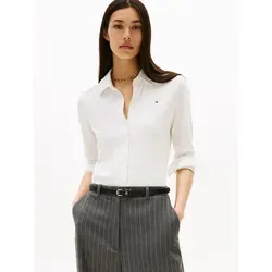 Tommy Hilfiger Poloshirt 1985 SLIM PIQUE BTN DOWN LS - Herren-Shirt in slim fit, aus einem bequemen Baumwollmix, ideal für einen lässigen Look. Perfekt für jeden Anlass mit einem eleganten Polokragen.
