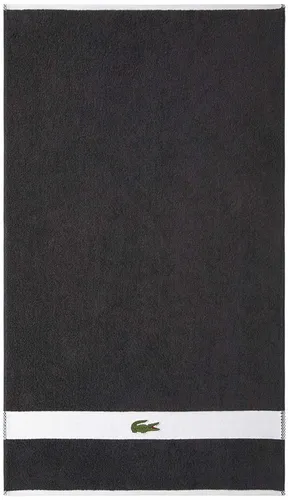 Lacoste Handtuch "LCASUAL", bitume, 55x100 cm - Das Lacoste Handtuch "LCASUAL" in bitume bringt modernen Stil ins Badezimmer. Hergestellt aus 100% Baumwolle, bietet es eine hohe Langlebigkeit und einen angenehmen Komfort. Ein edles Krokodil-Applikation verleiht dem Handtuch das gewisse Etwas.