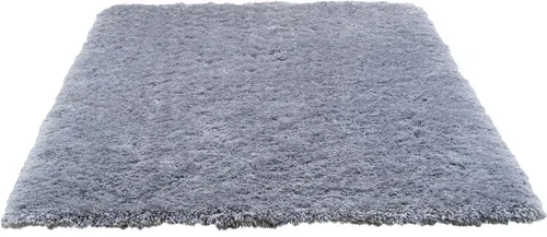 Hochflor-Teppich TOM TAILOR HOME "Flocatic" in Grau – 70cm x 140cm - Der stilvolle Hochflor-Teppich "Flocatic" von TOM TAILOR HOME setzt Akzente in jedem Wohnraum. Mit seinem dichten, weichen Flor und hochwertiger Verarbeitung sorgt er für gemütliche Atmosphäre und ist in verschiedenen Farben erhältlich.