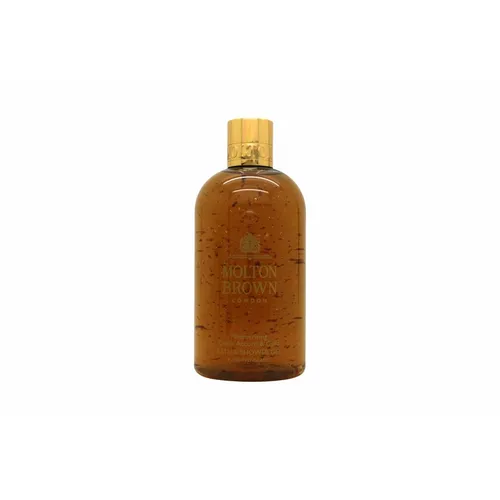Molton Brown Mesmerising Oudh Accord & Gold Bath & Shower Gel 300mL - Luxuriöse Körperwäsche mit fesselndem Oud-Duft, kombiniert mit Zimtblättern und Elemiöl für ein einzigartiges Duscherlebnis.
