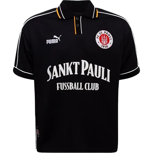 PUMA FC St. Pauli Retro Trikot schwarz-weiß 2XL Herren - Stylisches Retro Trikot von PUMA für Herren, ideal für Fans. Mit auffälligem Schriftzug auf der Brust und bequemer Passform für jeden Anlass.