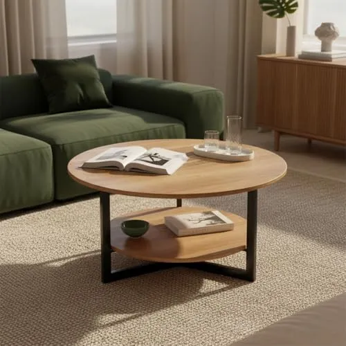skølm Couchtisch Drakkar aus Massivholz Eiche mit Metallgestell, Ø70 cm - Stilvoller Couchtisch aus Eiche mit modernem Metallgestell. Seine runde Form und zwei Ablageflächen bieten praktischen Stauraum, während die pflegeleichte Oberfläche für einen eleganten Akzent in Ihrem Wohnzimmer sorgt.
