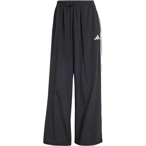 Adidas Essential 3-Streifen Woven Parachute Hose Damen - Schwarz - Hosen mit bequemer, lockerer Passform und weichem Material für optimale Bewegungsfreiheit. Die klassischen 3-Streifen sorgen für einen stylischen Look, perfekt für Freizeit und Sport.