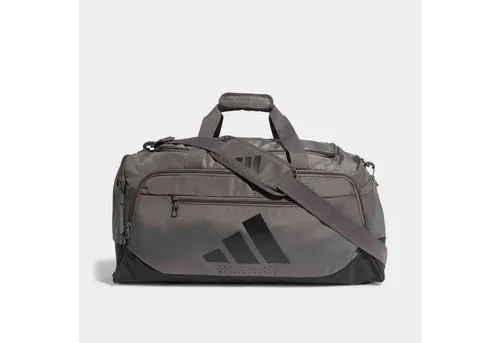 adidas Performance Sporttasche TRA DEF DUF M - Die vielseitige Training Defender Medium Dufflebag aus robustem Material bietet viel Platz für deine Fitnessutensilien. Mit abnehmbarem Schulterriemen und guter Belüftung bleibt alles frisch und bereit für den Einsatz.