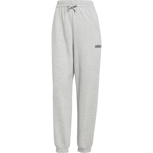 adidas Damen Essentials LINEAR French Terry Cuffed Pants - Trainingsbekleidung aus 55 % Baumwolle und recycelten Materialien, locker geschnitten mit hohem Bund für optimalen Komfort und Nachhaltigkeit.