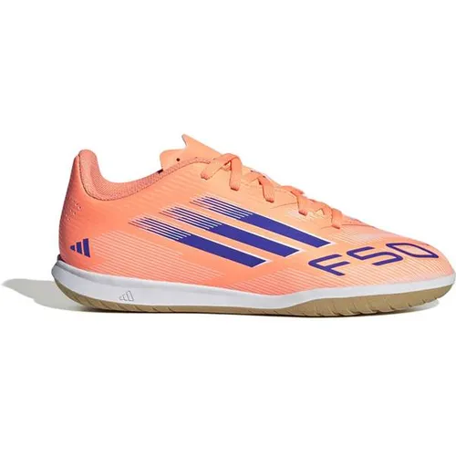 adidas Unisex Kids F50 Club IN Fußballschuh - Beam Orange/Lucid Blue - Fußballschuhe für Kinder mit regulärer Passform, abriebfester Gummiaußensohle und stylischem Design für optimale Leistung auf Hallenböden.
