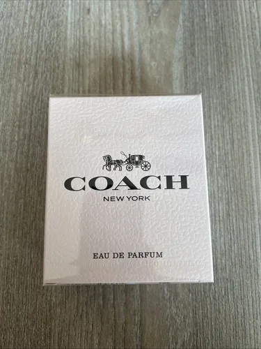 Coach New York Eau De Parfum Spray 50ml - Eau de Parfum für Herren mit blumigem Duft, ideal für besondere Anlässe. In eleganter Goldverpackung, perfekt als Geschenk.