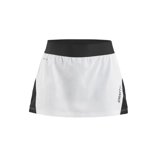 Craft Pro Control Impact Skirt Damen - Weiß/Schwarz - Der Craft Pro Control Impact Skirt bietet durch sein leichtes, elastisches Funktionsgewebe optimale Bewegungsfreiheit und Feuchtigkeitstransport. Mit integrierter Hotpants und Balltasche perfekt für sportliche Aktivitäten.