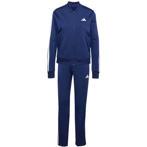 adidas Damen ESSENTIALS 3-STRIPES TRACKSUIT Dark Blue, XXL - Modischer 2-teiliger Track Suit für Damen, aus 100% recyceltem Polyester, mit praktischen Taschen und elastischem Bund für optimalen Tragekomfort.