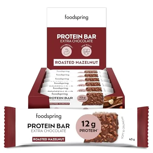 foodspring - Protein Riegel geröstete Haselnuss Layered Protein Bar 12x45g - Mit 12g Eiweiß pro Riegel & zuckerarm - Als Snack nach dem Training oder für unterwegs - Extra Chocolate Roasted Hazelnut
