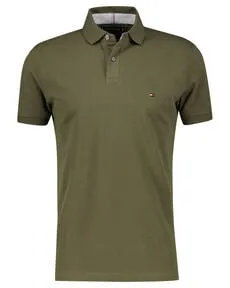 Tommy Hilfiger Poloshirt 1985 REGULAR POLO - Basic-Shirt aus hochwertigem Piqué, in trendigem army green, mit Logostickerei und bequemen Schlitzen für optimalen Tragekomfort.