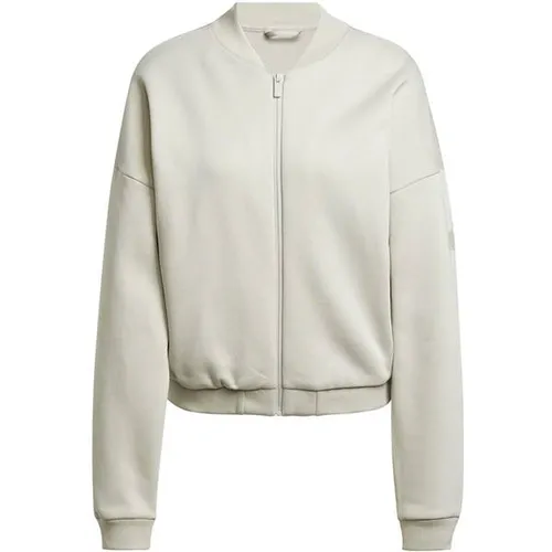 adidas Sportswear Outdoorjacke W SL+ FL BOMBER, Wonder Aluminium - Sportliche Jacke aus atmungsaktivem Material, ideal für Läufer. Loose Fit und Reißverschluss bieten optimalen Tragekomfort.