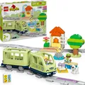LEGO DUPLO Interaktive Abenteuer-Eisenbahn - Lernspielzeug für Kleinkinder ab 2 Jahren – 14 Gleisstücke, Aktionssteine mit Geräuschen und 4 Spielfiguren – Geschenkidee für Jungen & Mädchen - 10427